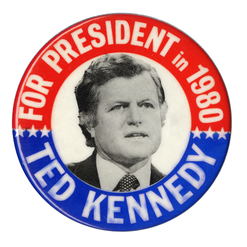 Round button with red and blue border and a black and white photograph of Ted Kennedy in the center. White text reads "FOR PRESIDENT in 1980 TED KENNEDY"