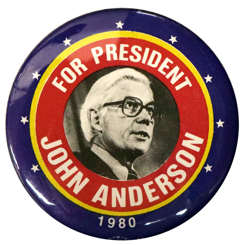 Round button with nested circular bands of blue, gold, and red, with a black and white photograph of John Anderson in the center. White text reads "FOR PRESIDENT JOHN ANDERSON 1980"