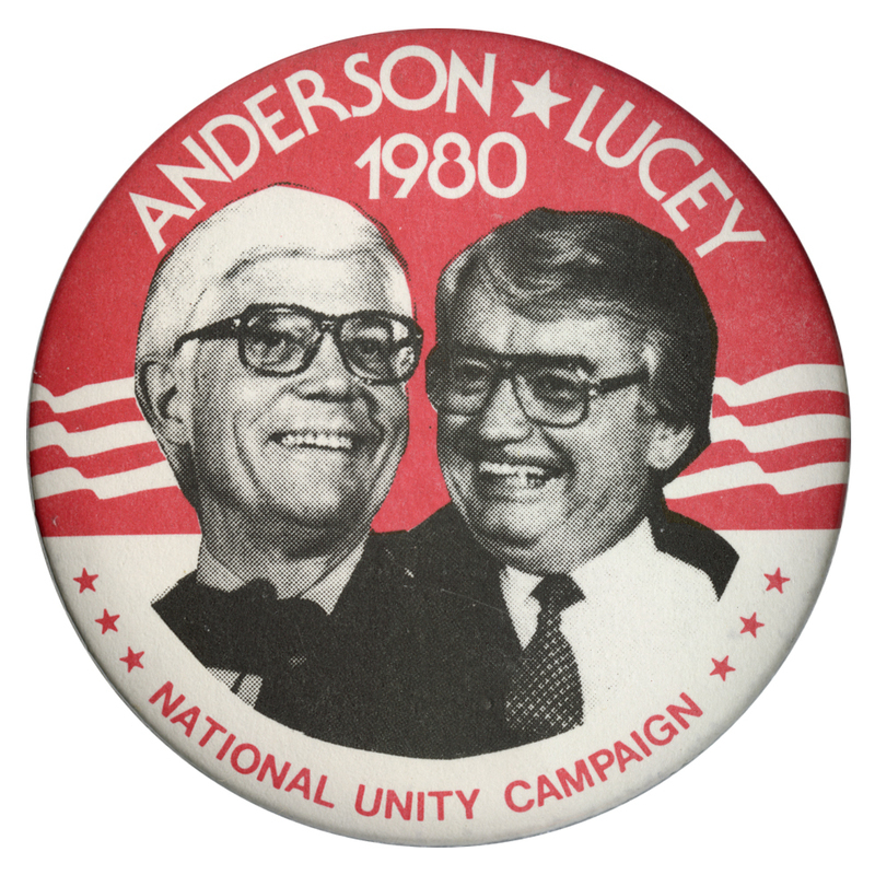 Round, red and white button with black and white photographs of John Anderson and Patrick Lucey surrounded by stars and stripes decorations. White and red text reads "ANDERSON-LUCEY 1980 NATIONAL UNITY CAMPAIGN"