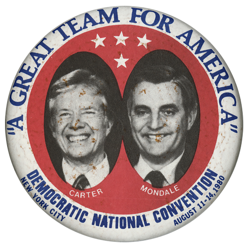 Round button with a white border and red center. Black and white photographs of Jimmy Carter and Walter Mondale occupy black circles in the middle below three white stars. Blue and white text reads ""A GREAT TEAM FOR AMERICA" CARTER MONDALE DEMOCRATIC NATIONAL CONVENTION NEW YORK CITY AUGUST 11-14, 1980"