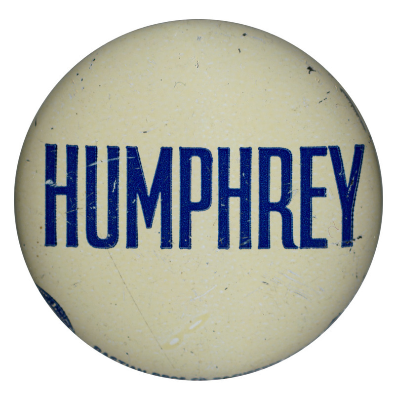 Round, off white button with the text "Humphrey."