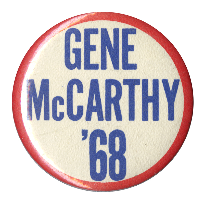 Round, white button edged in red with blue text reading "Gene McCarthy '68"
