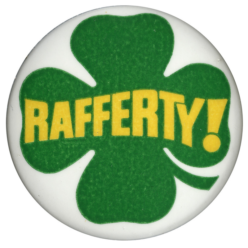 Round, white button with an illustration of a green four-leaf clover containing yellow text that reads "Rafferty!"