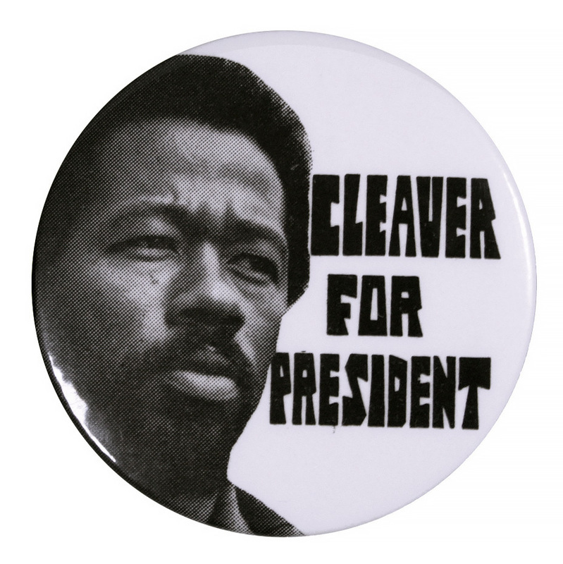 Round, white button with a portrait of Eldridge Cleaver and black text reading "Cleaver for President."