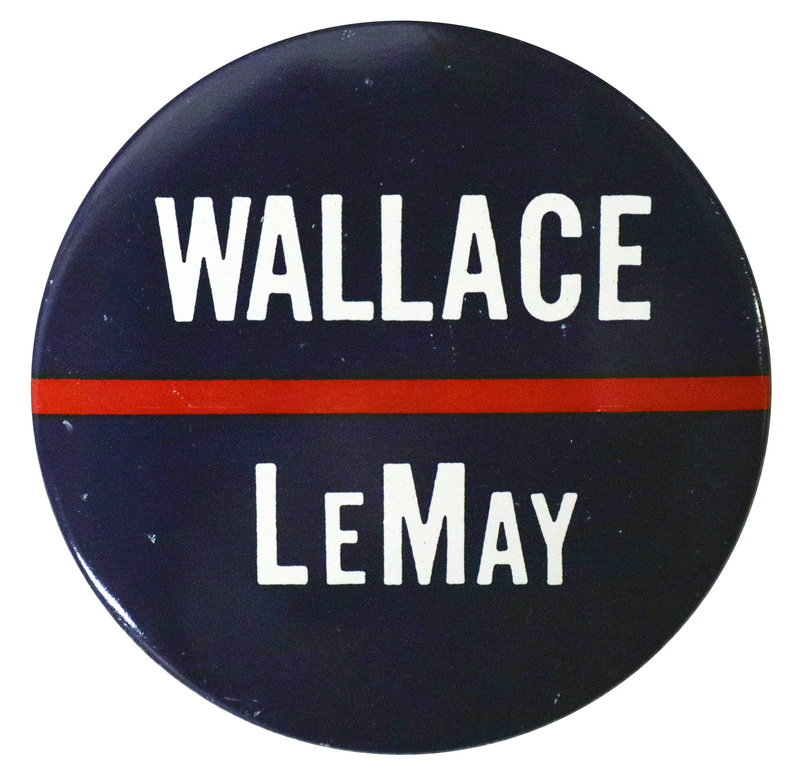 Round, blue button bisected by a red stripe. White text reads "Wallace LeMay."