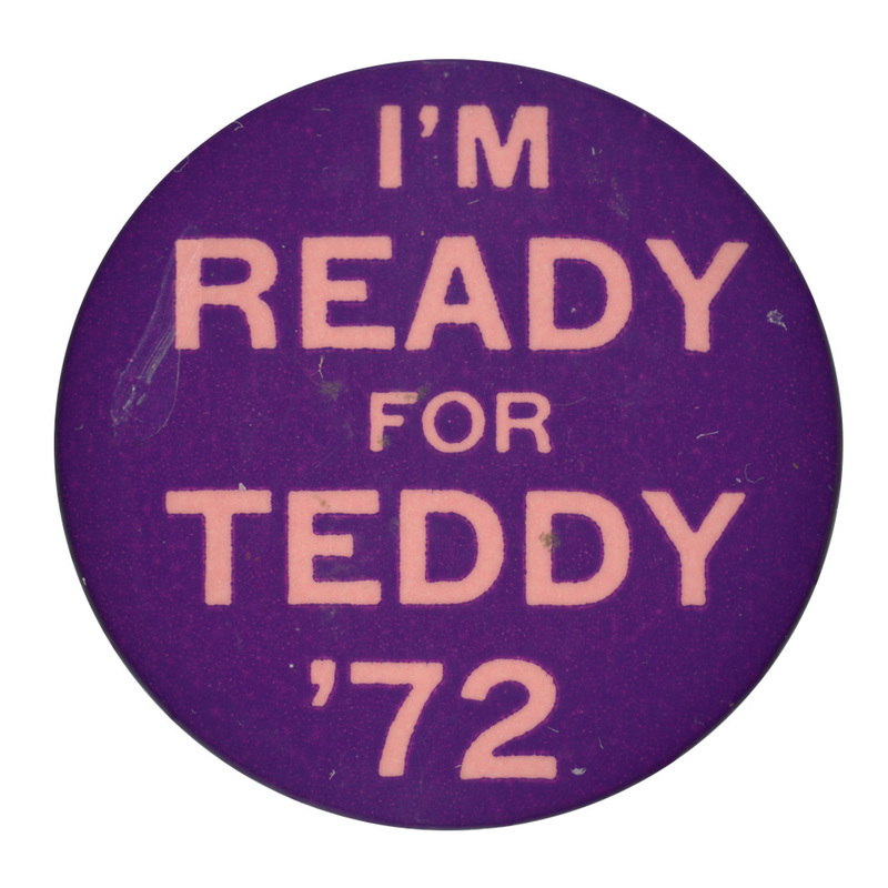 Round, black button with orange text reading "I'm Ready for Teddy '72"