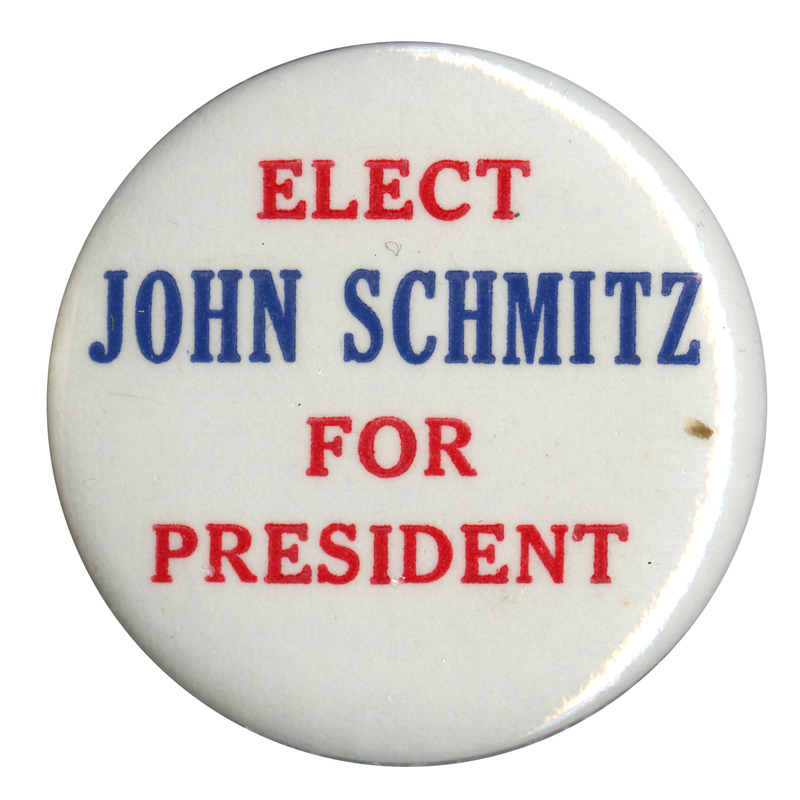 Round, white button with red and blue text reading "ELECT JOHN SCHMITZ FOR PRESIDENT"