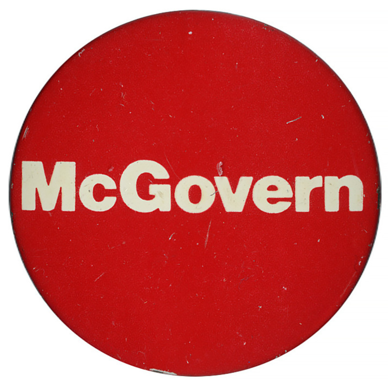 Round, red button with white text reading "McGovern"