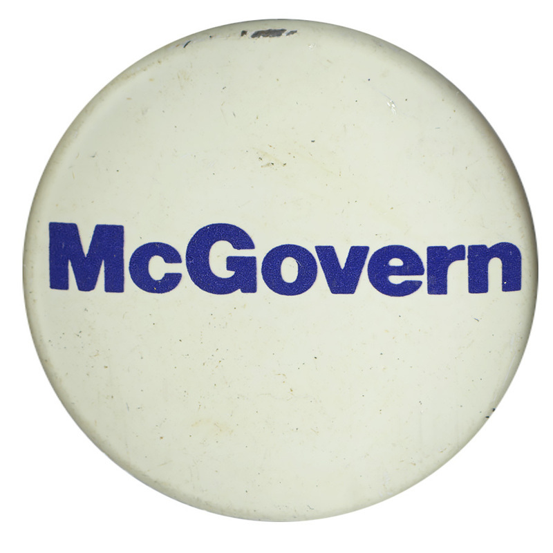 Round, white button with white text reading "McGovern"