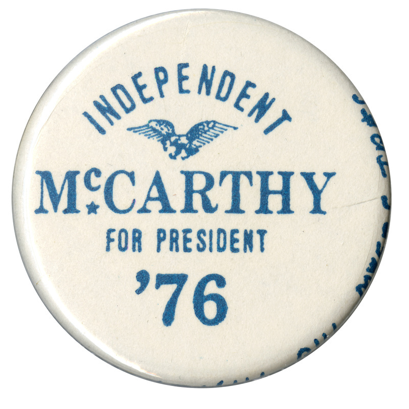Round, white button with a blue eagle and blue text reading "INDEPENDENT McCARTHY FOR PRESIDENT '76"