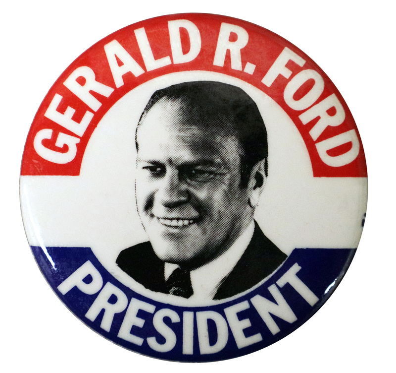 Round, white button with red and blue bands along the edge and a black and white portrait of Gerald Ford. White text reads "GERALD R. FORD PRESIDENT"
