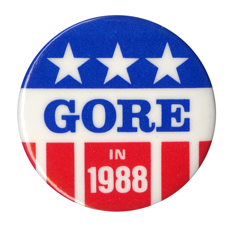 Round button with red, white, and blue stars and stripes decoration and blue text reading "GORE IN 1988"