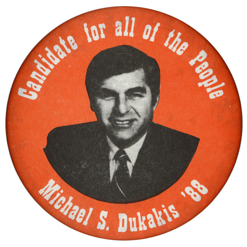 Round, orange button with a black and white photograph of Michael Dukakis. White text reads "Candidate for all of the People Michael S. Dukakis '88"