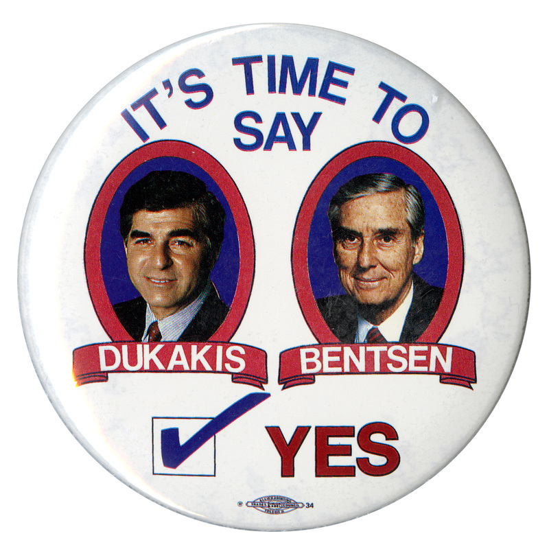 Round, white button with color photographs of Michael Dukakis and Lloyd Bentsen, each with his name under his photograph. Blue text reads "IT'S TIME TO SAY YES". "YES" is accompanied by a large checkmark in a box.
