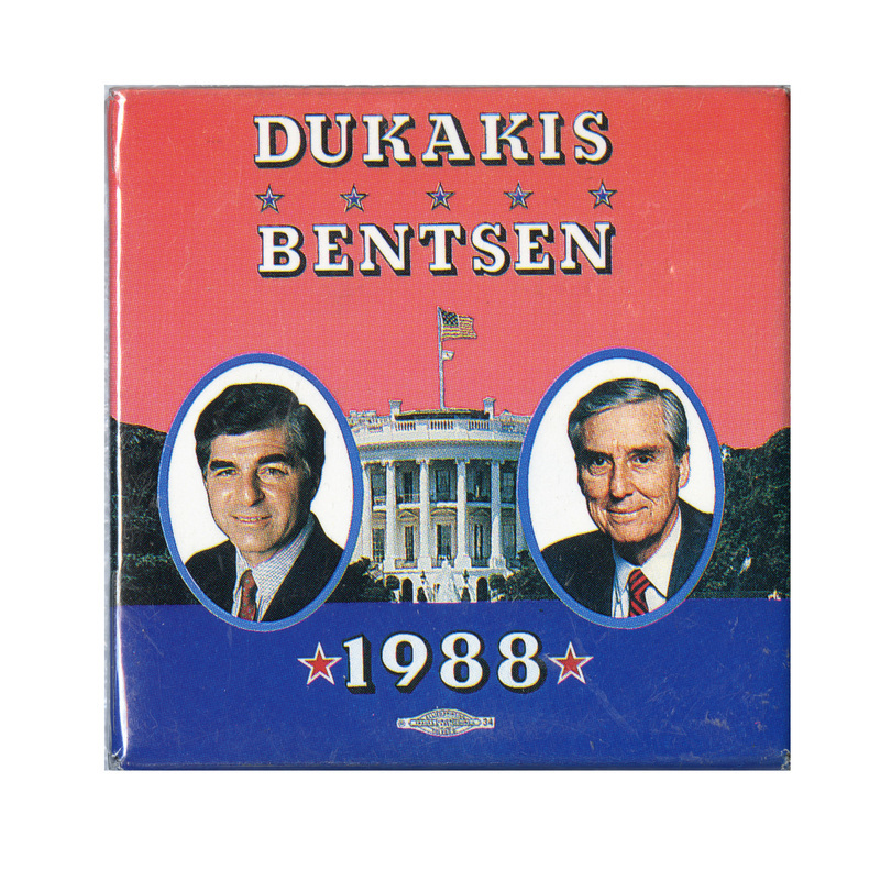 Square button with a red upper half. In the lower half are color photographs of Michael Dukakis and Lloyd Bentsen against a color photograph of the White House. White text reads "DUKAKIS BENTSEN 1988"