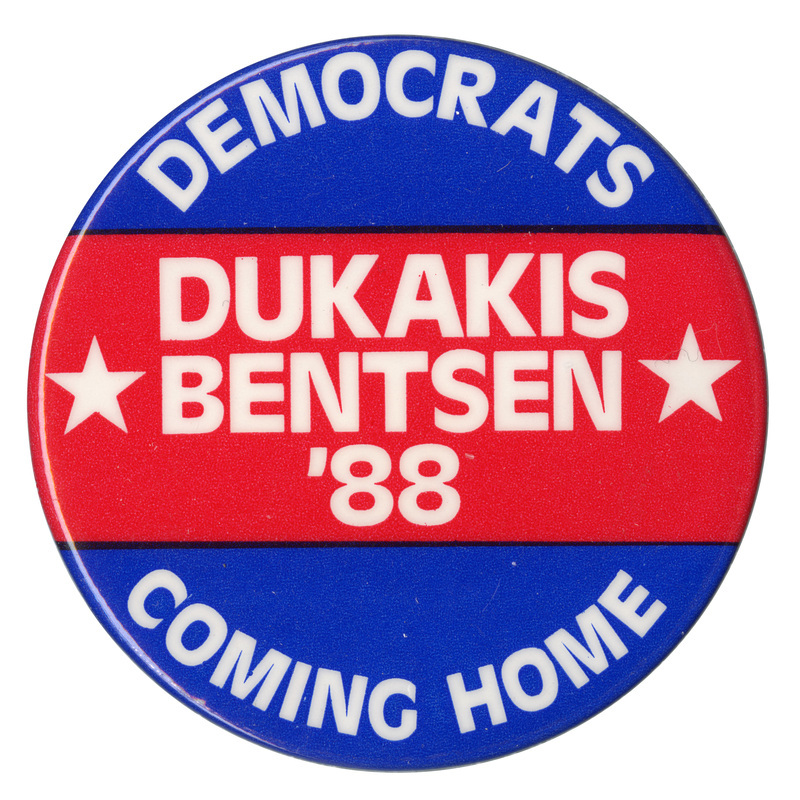 Round, red and blue button with white text reading "DEMOCRATS COMING HOME DUKAKIS BENTSEN '88"