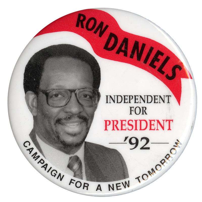 Round, white button with a black and white photograph of Ron Daniels. Black and red text reads "RON DANIELS INDEPENDENT FOR PRESIDENT '92 CAMPAIGN FOR A NEW TOMORROW!"