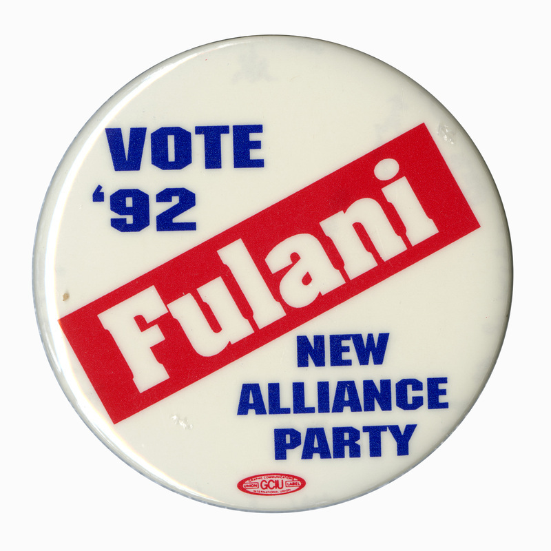 Round, white button with red, white, and blue text reading "VOTE '92 Fulani NEW ALLIANCE PARTY"