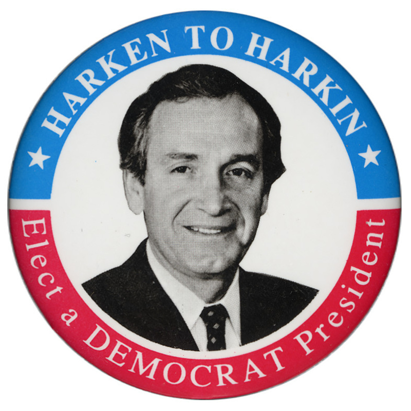 Round button with a blue and red border and a black and white photograph of Tom Harkin in the center. White text reads "HARKEN TO HARKIN Elect a DEMOCRAT President"
