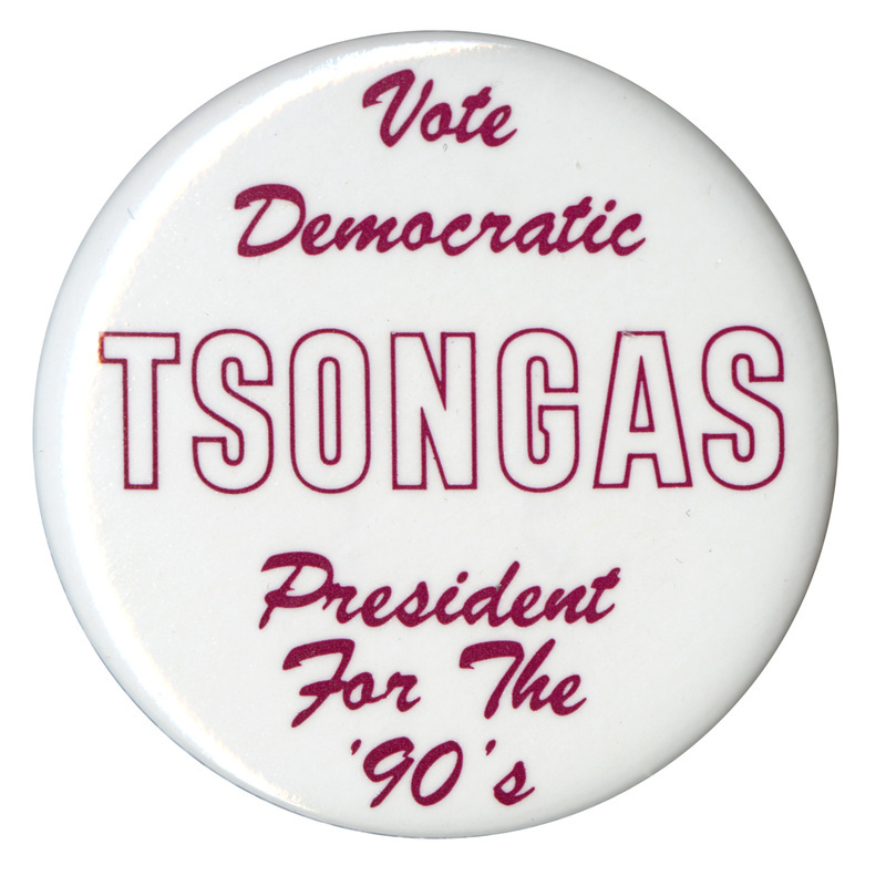 Round, white button with black text reading "Vote Democratic TSONGAS President For The '90's"