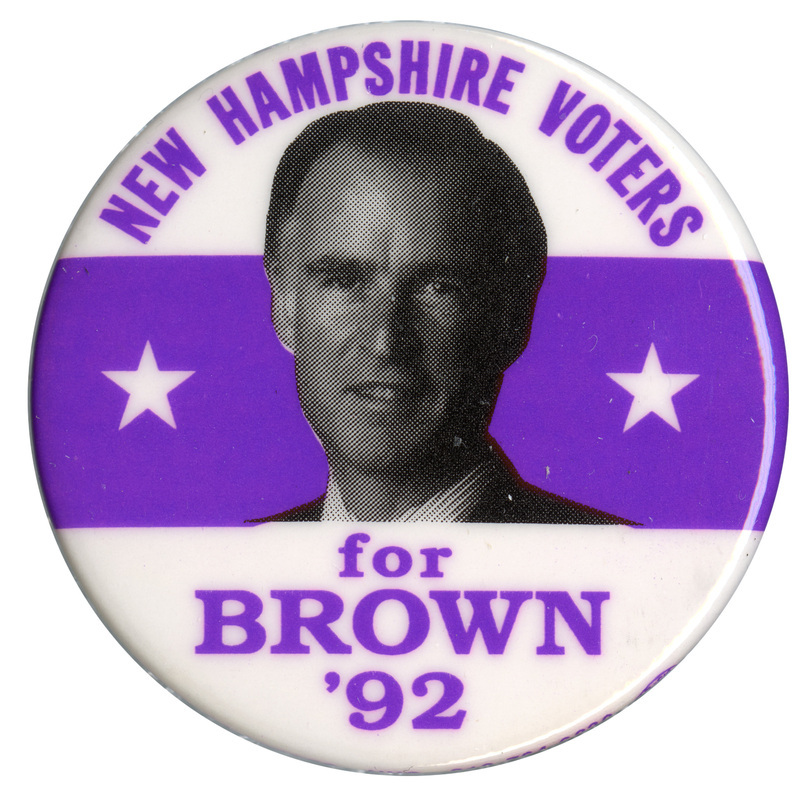 Round, white and purple button with a black and white photograph of Jerry Brown in the middle. Purple text reads "NEW HAMPSHIRE VOTERS for BROWN '92"