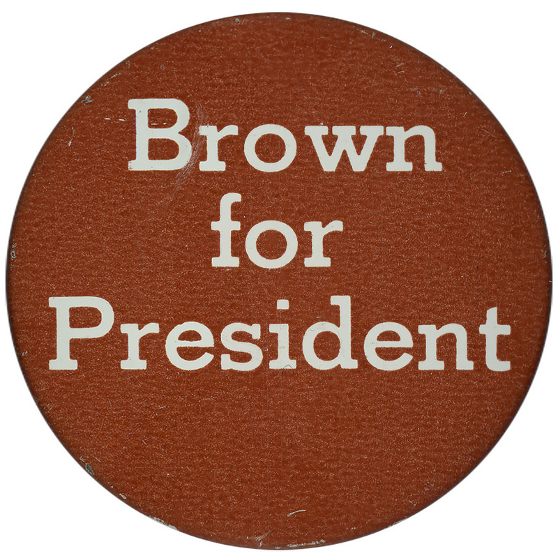 Round, brown button with white text reading "Brown for President"