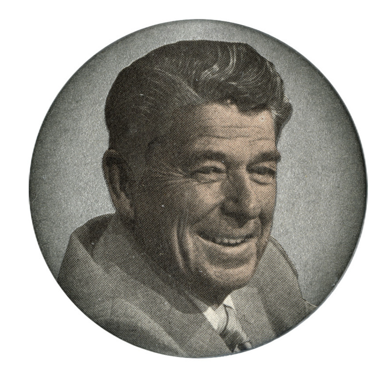 Round button with a color photograph of Ronald Reagan.