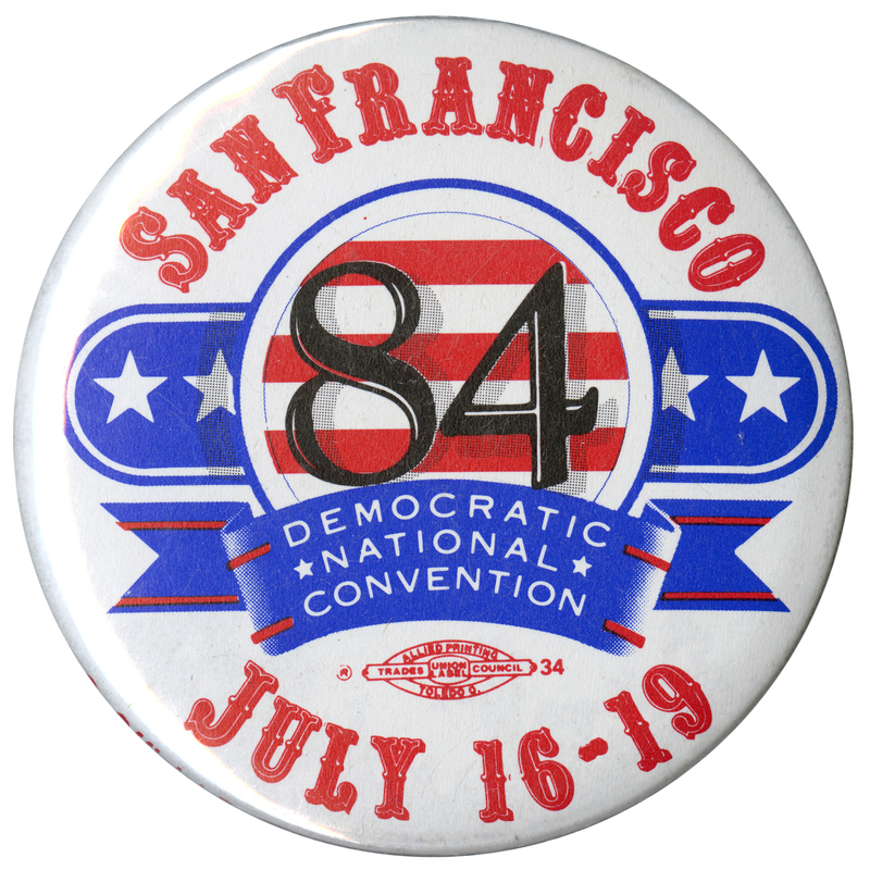 Round, white button with text reading "SAN FRANCISCO 84 DEMOCRATIC NATIONAL CONVENTION JULY 16-19," surrounded by ribbon and star decorations in red, white and blue.