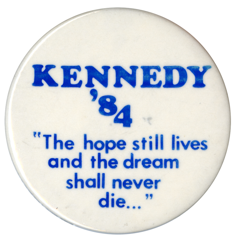 Round, white button with blue text reading "KENNEDY '84 "The hope still lives and the dream shall never die...""