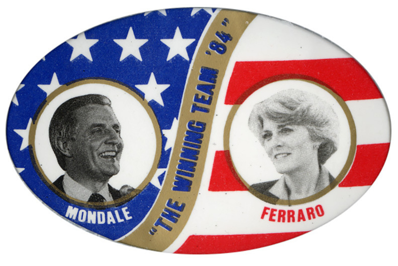 Oval button with red, white, and blue stars and stripes decorations and black and white portraits of Walter Mondale and Geraldine Ferraro. Text reads ""THE WINNING TEAM '84" MONDALE FERRARO"