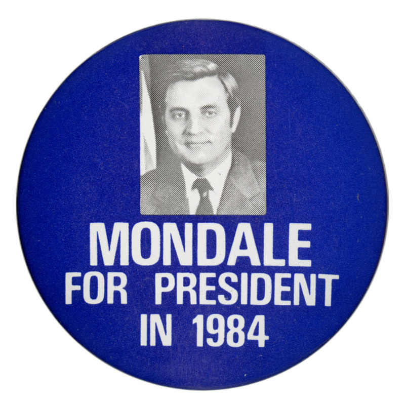 Round, blue button with a black and white photograph of Walter Mondale. White text reads "MONDALE FOR PRESIDENT IN 1984"
