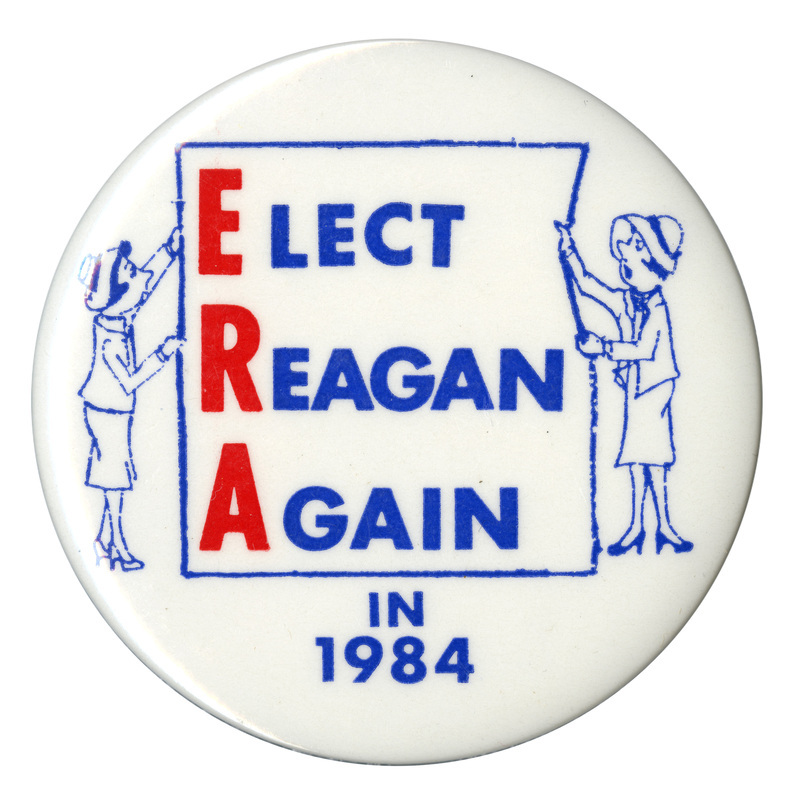 Round, white button with a blue line drawing of two women grasping a square outline. Red and blue text reads "ELECT REAGAN AGAIN IN 1984." The first letters of "ELECT REAGAN AGAIN" are highlighted in red to read "ERA" (Equal Rights Amendment"