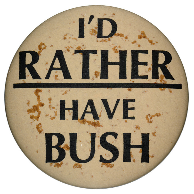 Round, beige button with black text reading "I'D RATHER HAVE BUSH"
