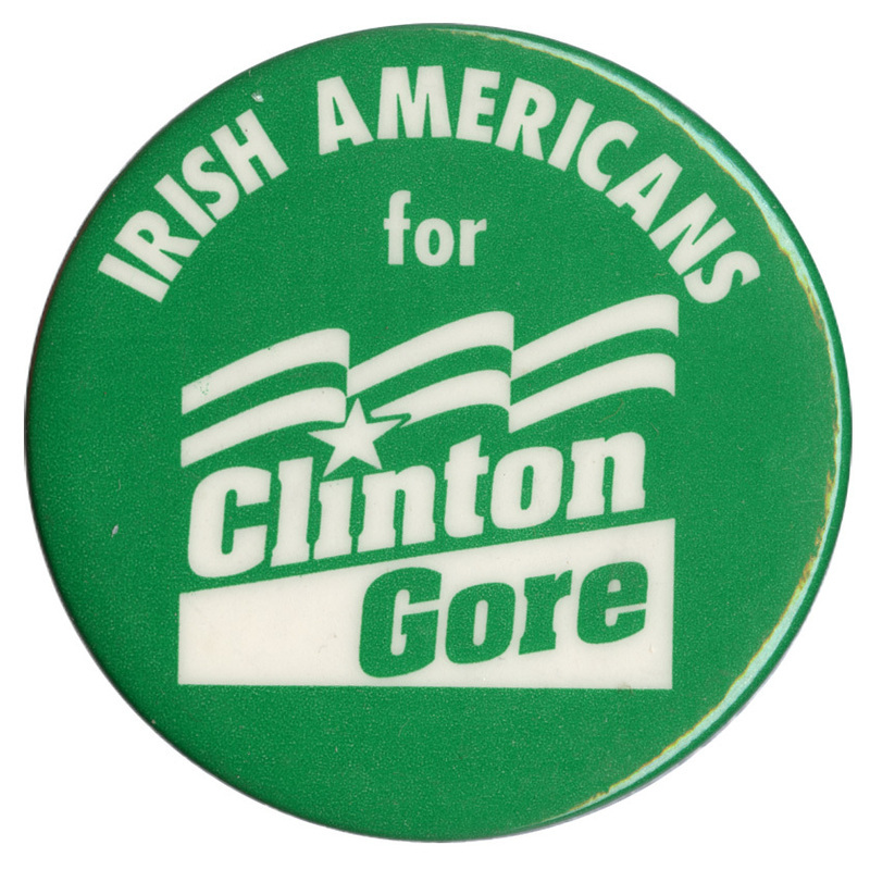 Round, green button with white text reading "IRISH AMERICANS for CLINTON GORE"