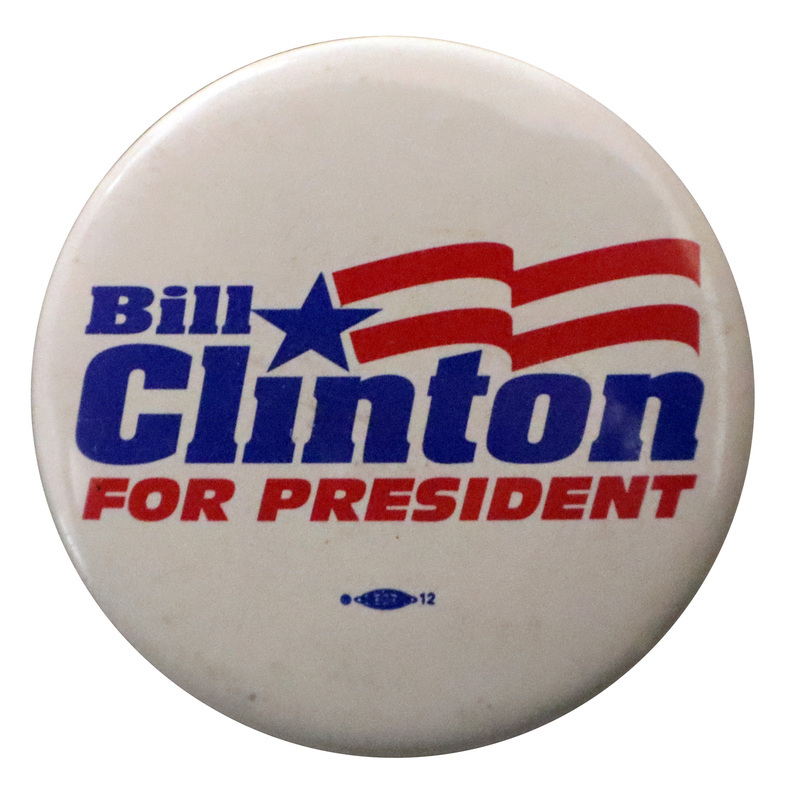 Round, white button with blue and red text reading "Bill Clinton FOR PRESIDENT"