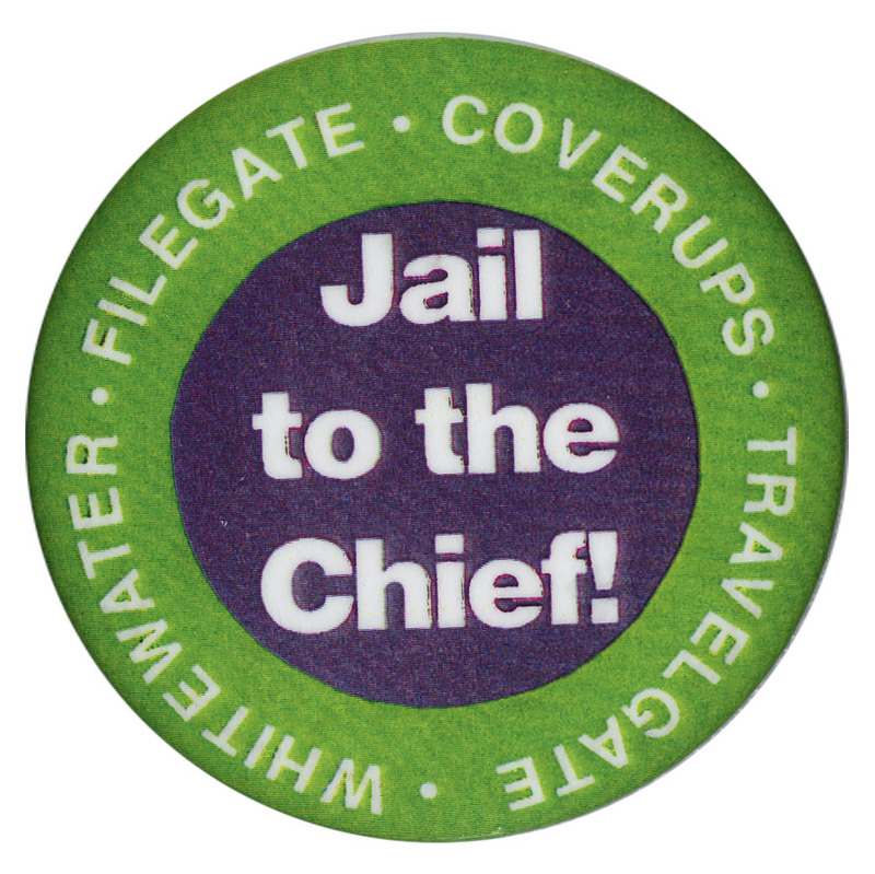 Round button with a green border and black center. White text reads "Jail to the Chief! WHITEWATER FILEGATE COVERUPS TRAVELGATE"
