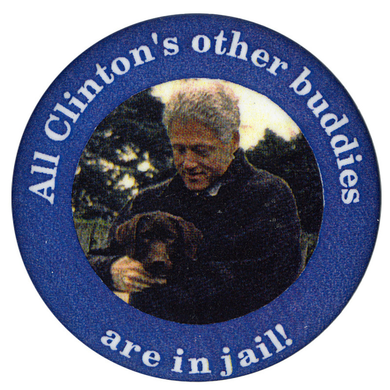 Round button with a blue border around a color photograph of Bill Clinton and the Clinton dog, Buddy. White text reads Al Clinton's other buddies are in jail!