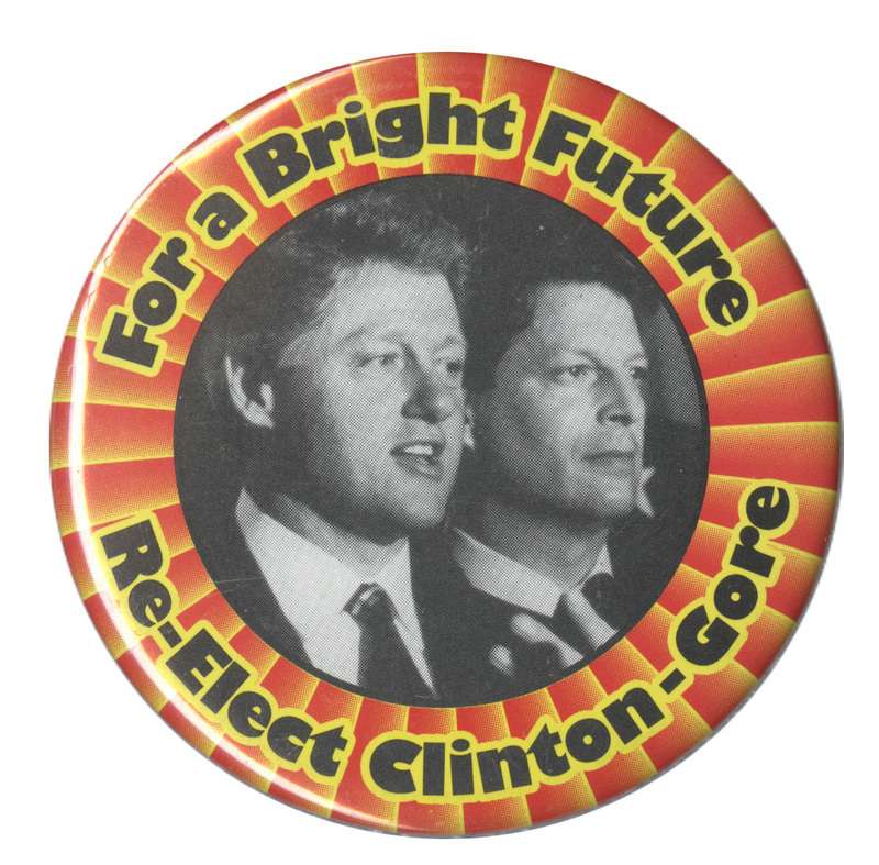 Round button with a red and yellow patterned border around a black and white photograph of Bill Clinton and Al Gore. Black and yellow text reads "For a Bright Future Re-Elect Clinton-Gore"