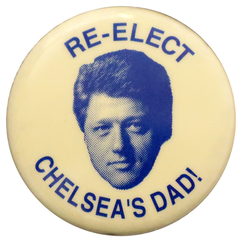 Round, off white button with a blue and white photograph of Bill Clinton's head. Blue text reads "RE-ELECT CHELSEA'S DAD!"