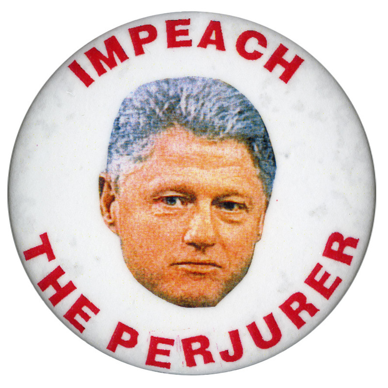 Round, white button with a color photograph of Bill Clinton's face. Red text reads "IMPEACH THE PERJURER"