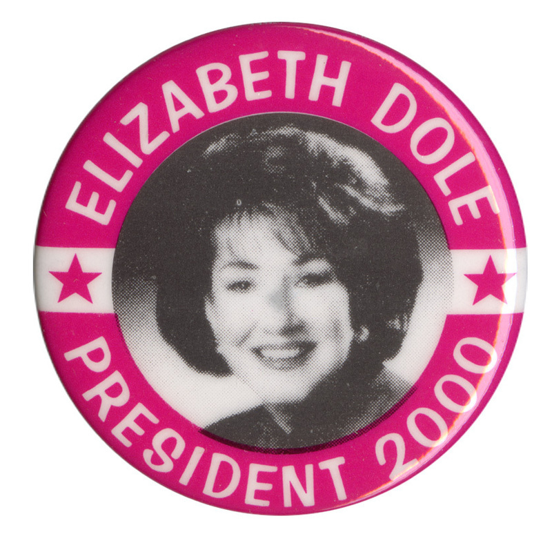 Round button with a red border. In the center is a black and white photograph of Elizabeth Dole. White text reads "ELIZABETH DOLE PRESIDENT 2000"