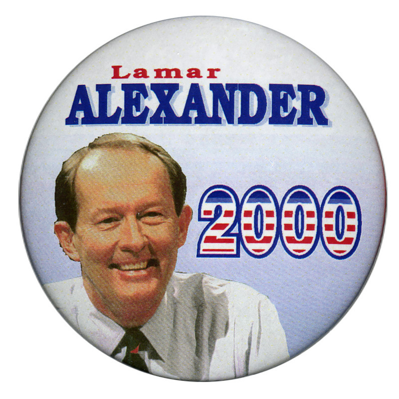Round, pale blue button with a color photograph of Lamar Alexander. Red and blue text reads "Lamar ALEXANDER 2000"