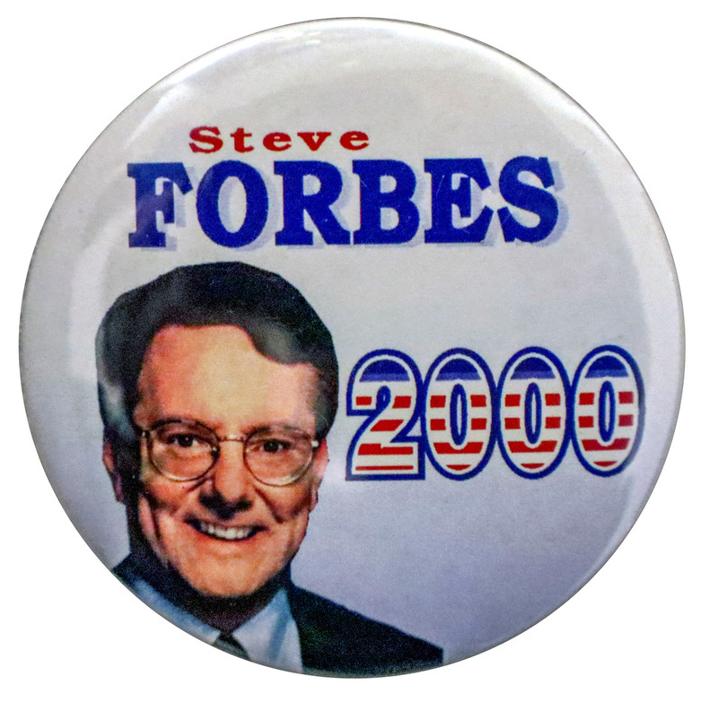 Round, pale blue button with a color photograph of Steve Forbes. Red and blue text reads "Steve FORBES 2000"