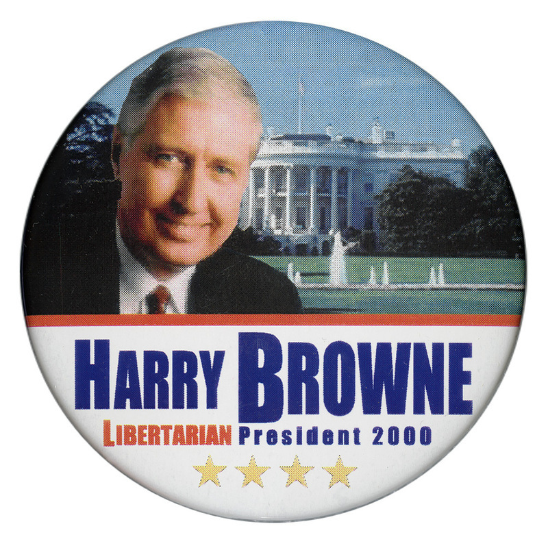 Round button with an upper section containing a color photograph of Harry Browne against a color photograph of the White House. The lower section has a white background and blue and red text reading "HARRY BROWNE LIBERTARIAN President 2000"