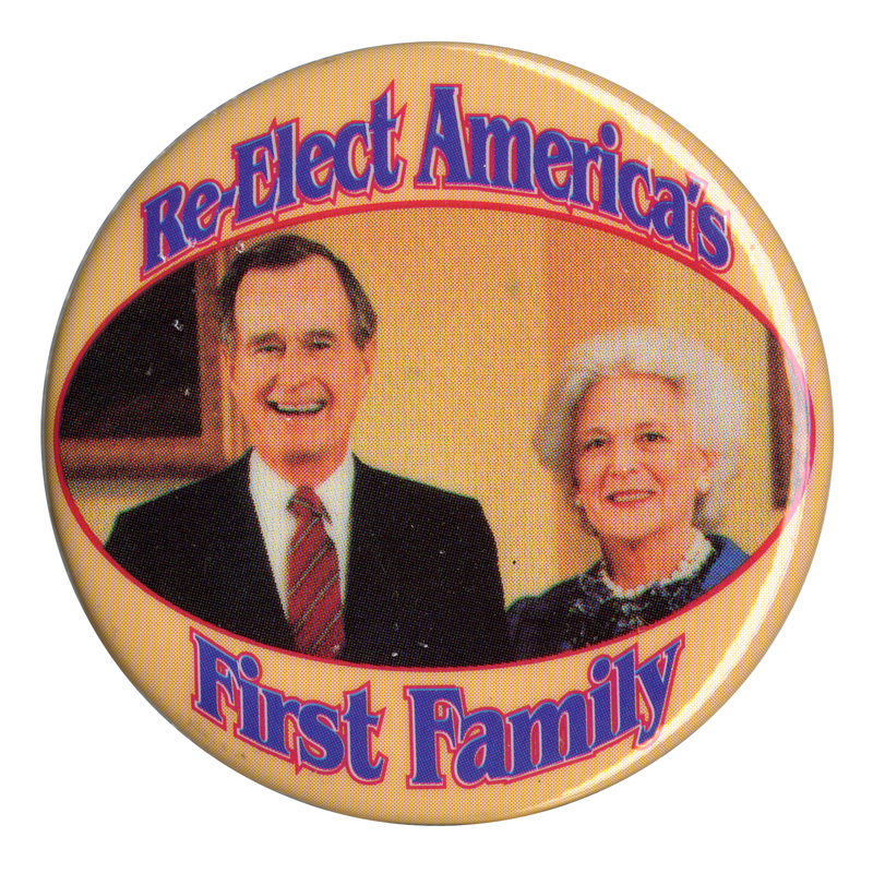 Round, yellowish button with a color photograph of George H. W. and Barbara Bush. Blue text reads "Re-Elect America's First Family"