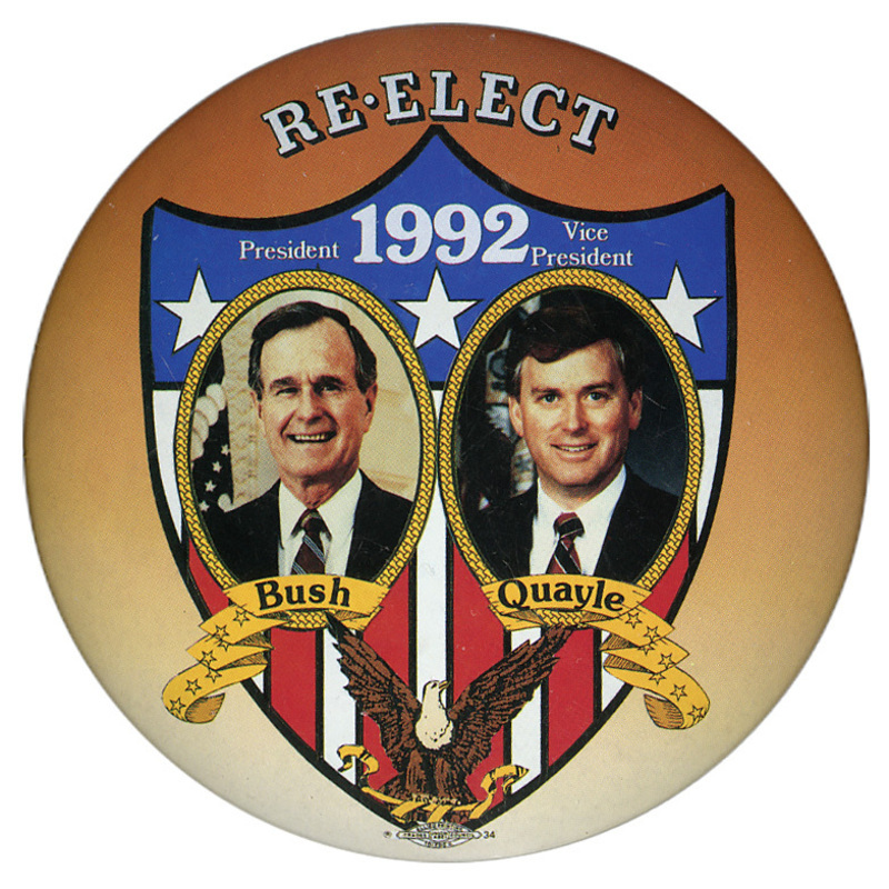 Round, orange button with an elaborate red, white, and blue shield, an eagle drawing, and color photographs of George H. W. Bush and Dan Quayle, each with his last name below his photograph. White text reads "RE-ELECT 1992"
