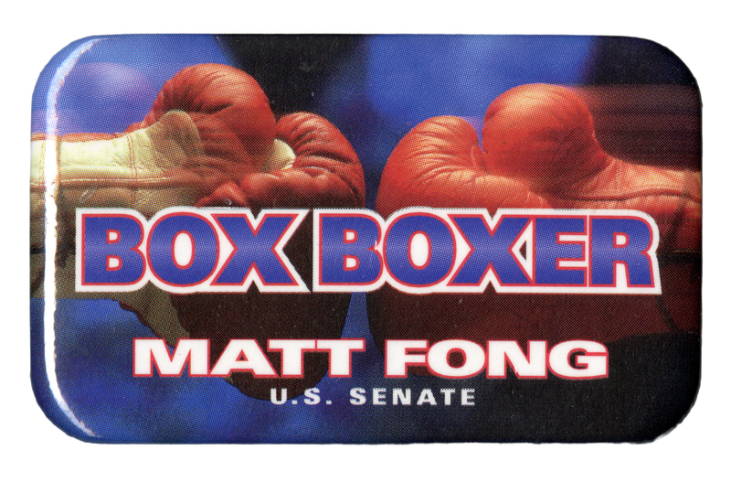 Rectangular button with a color photograph of two red boxing gloves. Blue and white text reads "BOX BOXER MATT FONG U.S. SENATE"