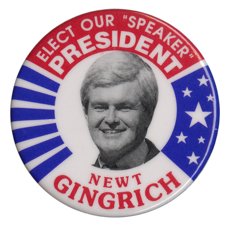 Round, white button with blue and red stars and stripes decorations. A black and white photograph of Newt Gingrich is in the center. White and red text reads "ELECT OUR "SPEAKER" PRESIDENT NEWT GINGRICH"