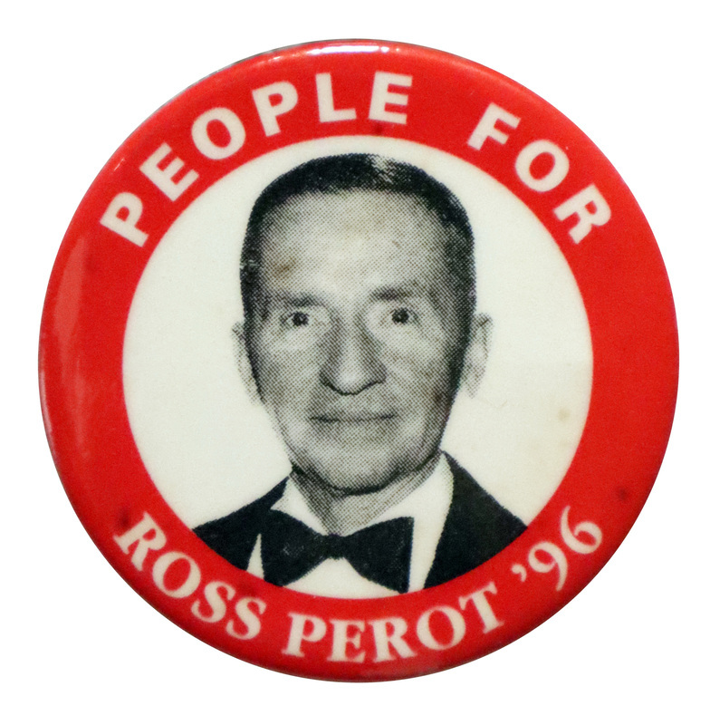 Round button with a red border and white interior circle with a black and white photograph of Ross Perot. White text around the edge reads "PEOPLE FOR ROSS PEROT '96"