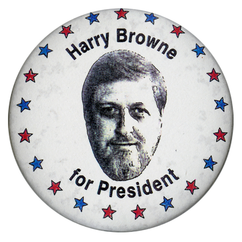 Round, white button with red and blue stars along the edge. In the center is a black and white photograph of Harry Browne. Black text reads "Harry Browne for President"